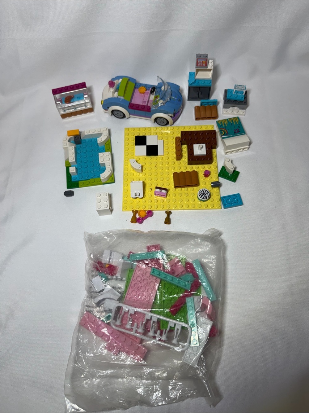 Lego pink, teal, white and yellow convertible playset with accessories